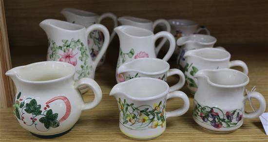 A collection of eleven Rye pottery jugs